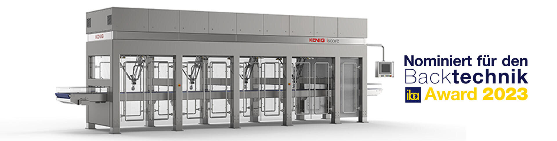 Eine große industrielle Bäckereimaschine von KONIG, gezeigt in einem sauberen, modernen Umfeld mit der Aufschrift "Nominiert für den Backtechnik Award 2023" auf der rechten Seite.