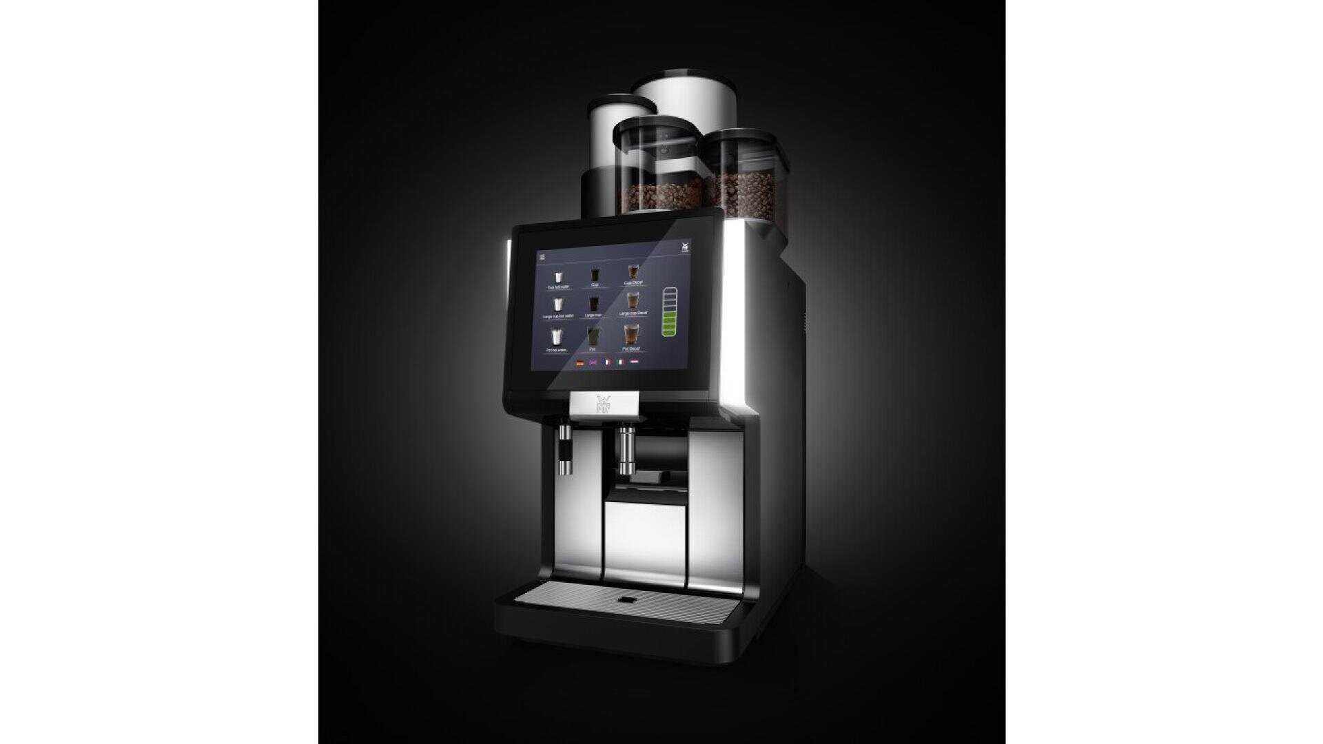 A modern, stainless steel automatic coffee machine with a large touchscreen display, multiple beverage options, and several bean containers on top, set against a dark background.