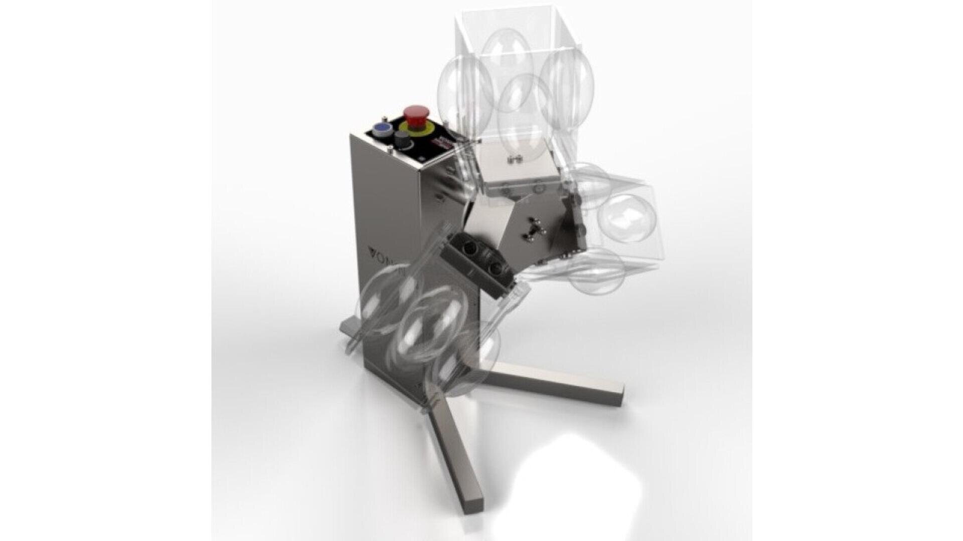 A metallic industrial machine with transparent protective covers, a control panel featuring buttons and switches, and a sturdy tripod-style base, photographed on a white background.