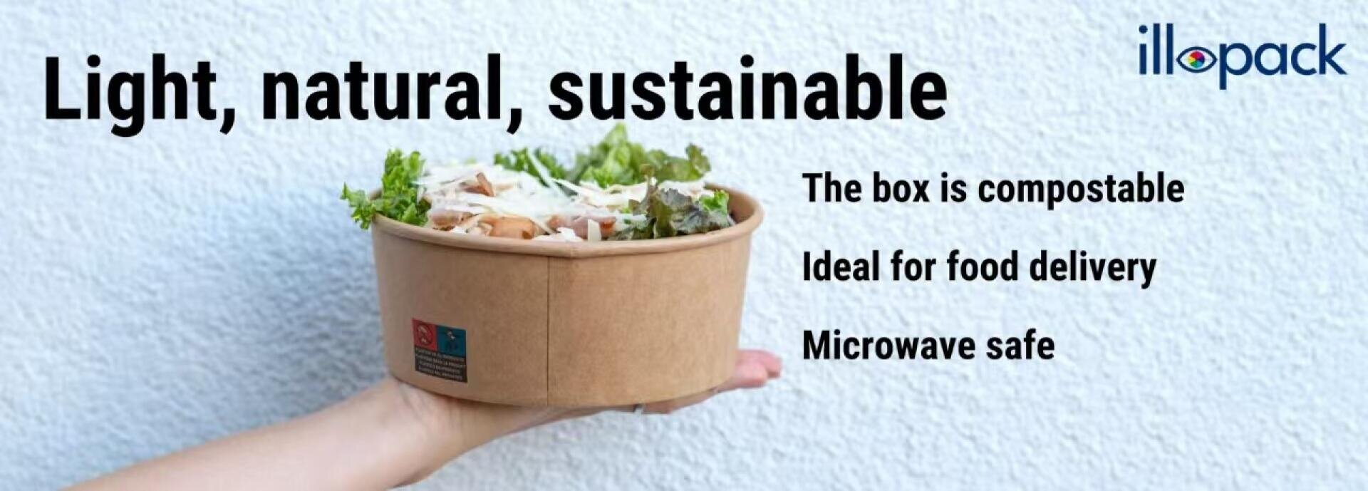 A hand holds a compostable brown food container filled with salad. Text reads: “Light, natural, sustainable. The box is compostable. Ideal for food delivery. Microwave safe.” The illopack logo appears in the top right corner.
