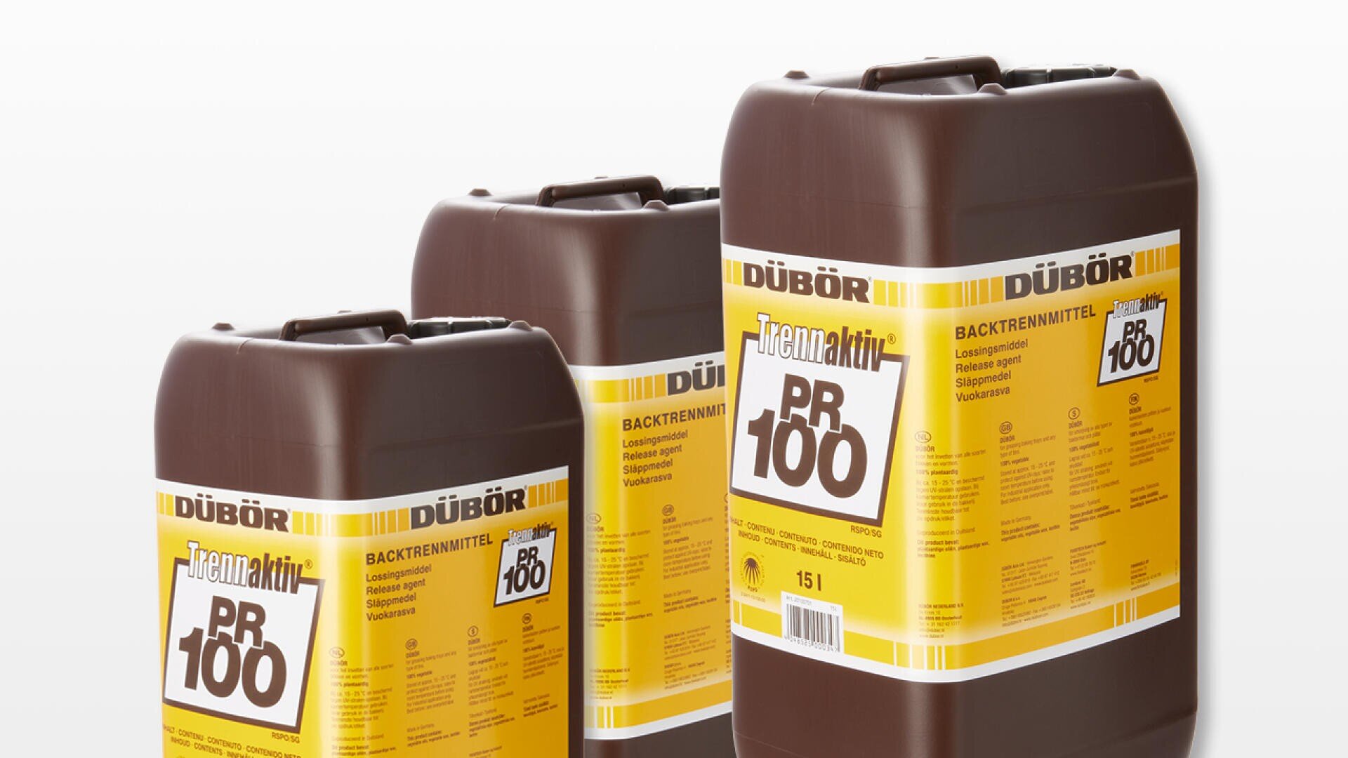 Abgebildet sind drei große braune Kunststoffbehälter mit gelben Etiketten mit der Aufschrift DÜBÖR Tectan aktiv PR 100. Die Etiketten enthalten Text in deutscher Sprache und Produktinformationen in Schwarz-Weiß auf gelbem Hintergrund.