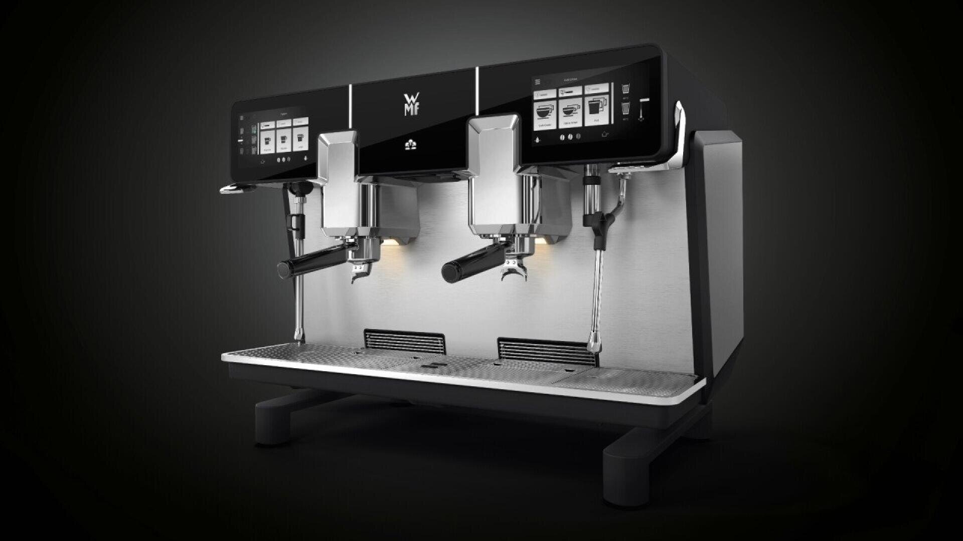 A modern, professional espresso machine with two group heads, a digital display, and stainless steel finish, set against a dark background.
